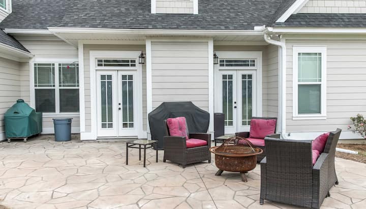 Elevate Your Outdoor Living Space with Stunning Stamped Concrete Patio in Mesa, AZ - Choose from a Variety of Creative Patterns and Colors to Achieve a Unique and Eye-Catching Look for Your Patio with Long-Lasting Durability and Low-Maintenance.